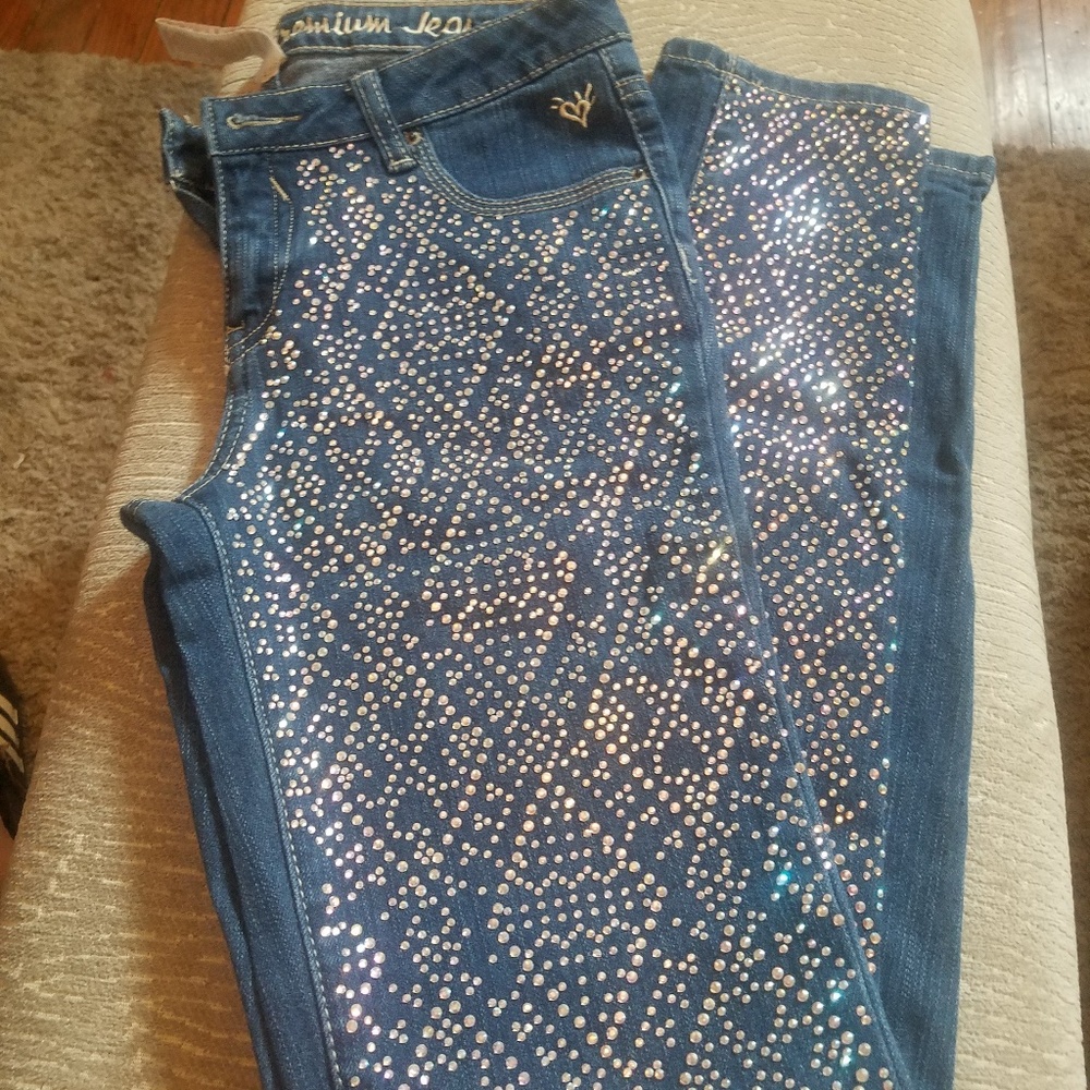 Justice stretch jeans with rhinestones.